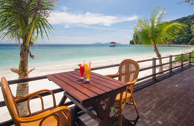 trestle table and chairs in seaside restaurant of Summer Bay Lang Tengah Island Resort