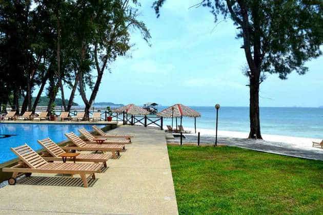 tinggi island tad marine resort sea view pool surround with deck chairs