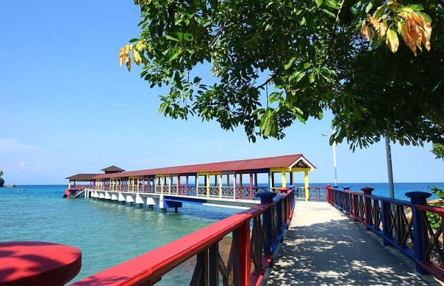 colorful perhentian island jetty concrete bridge above sea