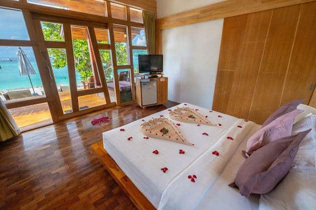 koh lipe island bundhaya villas seaview bungalow with rose petals on bed
