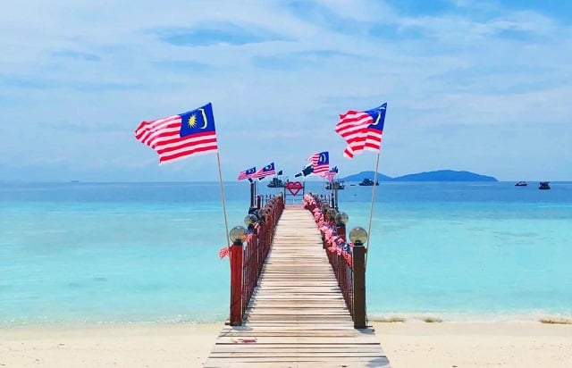 lang tengah island jetty bridge malaysia flag