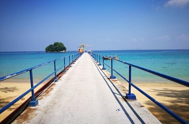 empty pulau tioman island jetty bridge above clear seawater