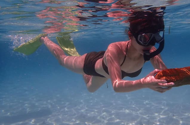 woman snorkeling in pulau tioman island sea