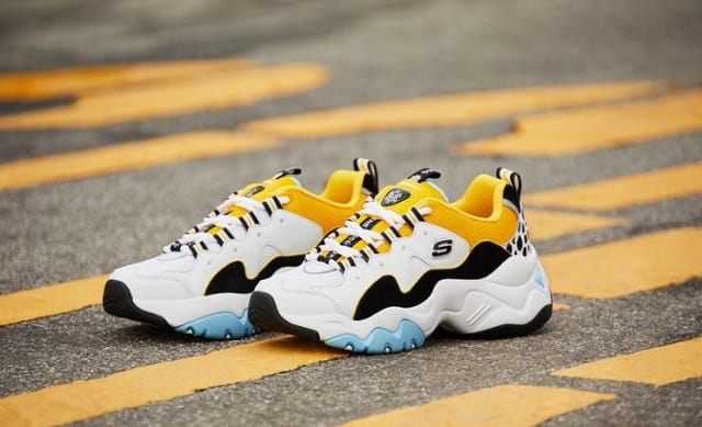 yellow white and black sports shoes