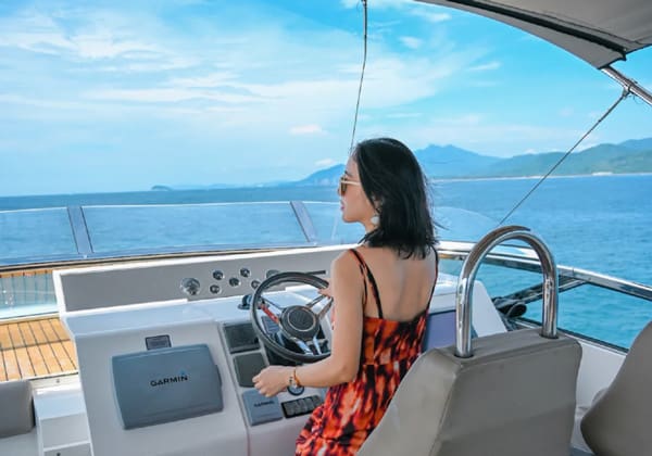 tinggi island woman back yacht