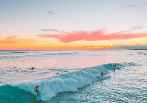 people surfing at tinggi island sea