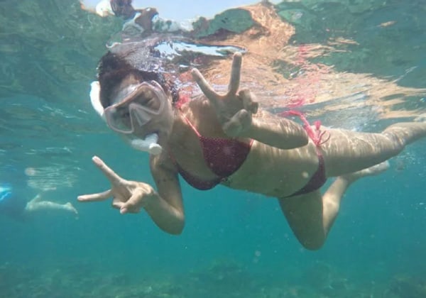 tinggi island woman bikini snorkeling mask