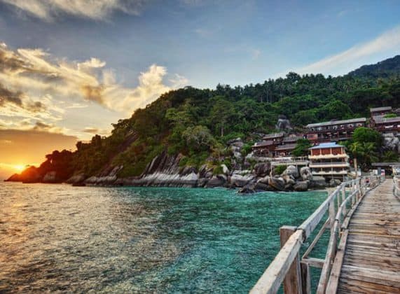 wooden bridge leading to Lanting Beach Resort Pemanggil Island