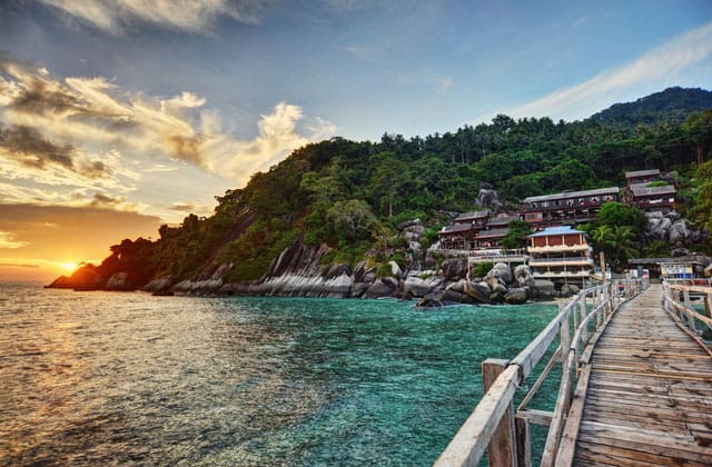 wooden bridge leading to Lanting Beach Resort Pemanggil Island