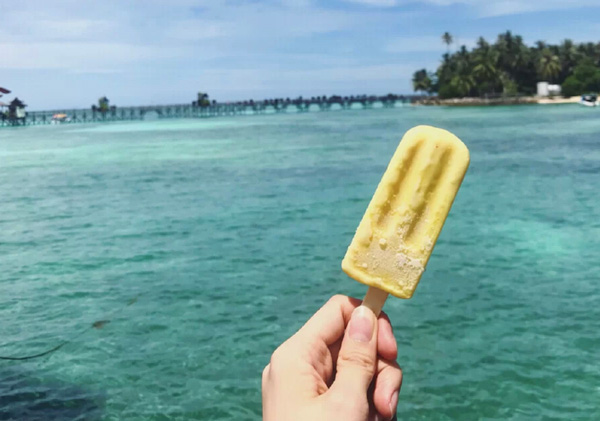 semporna island resort hand holding icecream