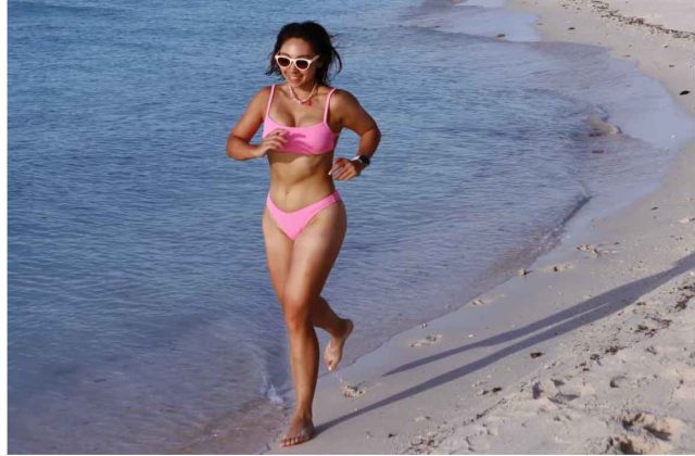 woman running beach dayang island